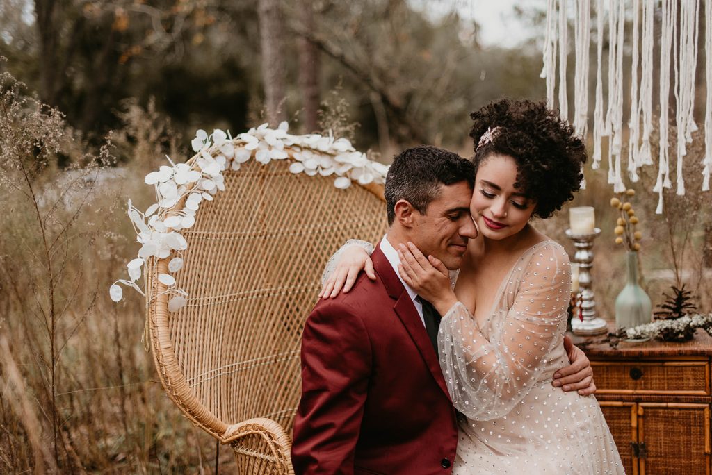 bride and groom sitting on chair