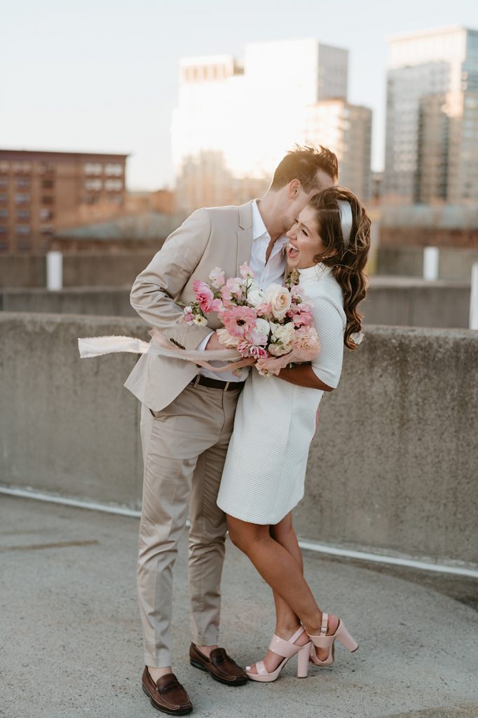 bride and groom laughing