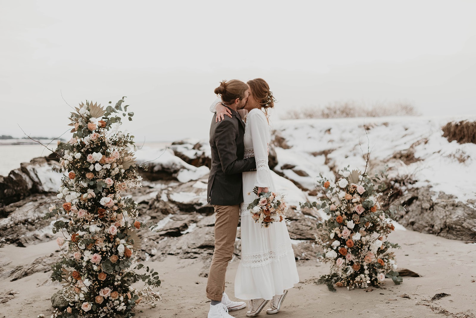 bride and groom getting married on beach