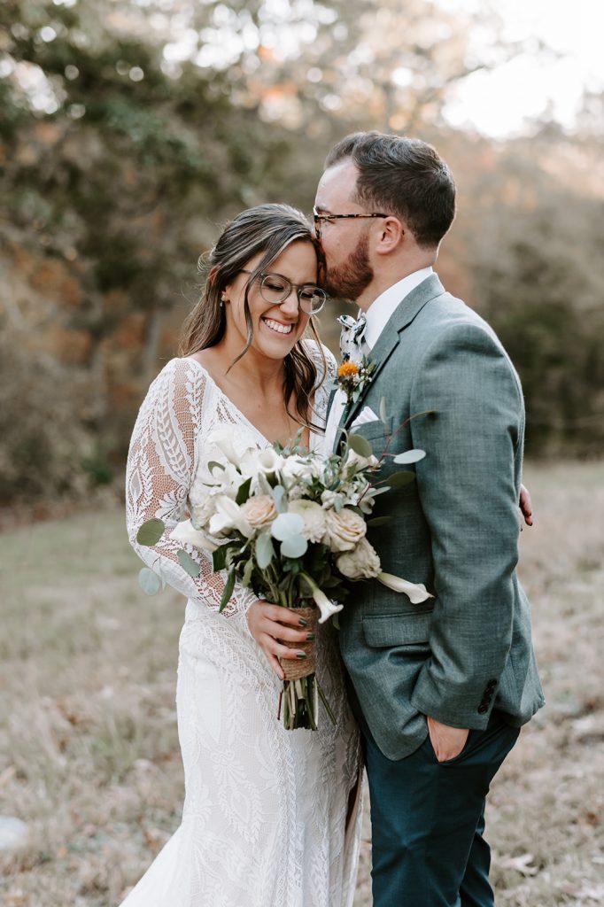 bride and groom kissing