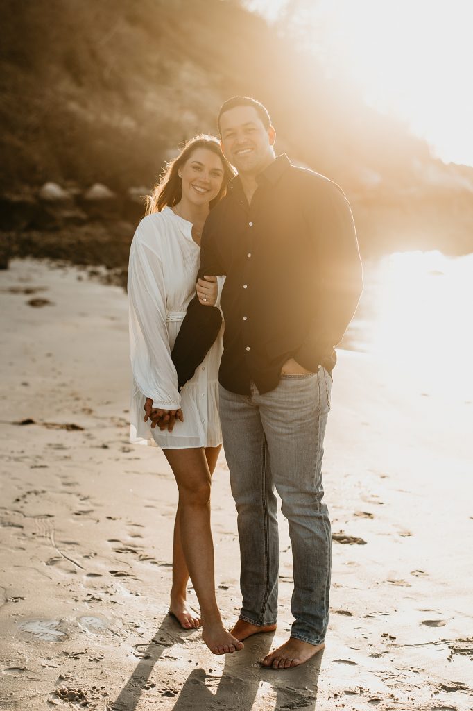 couple smiling on a beach